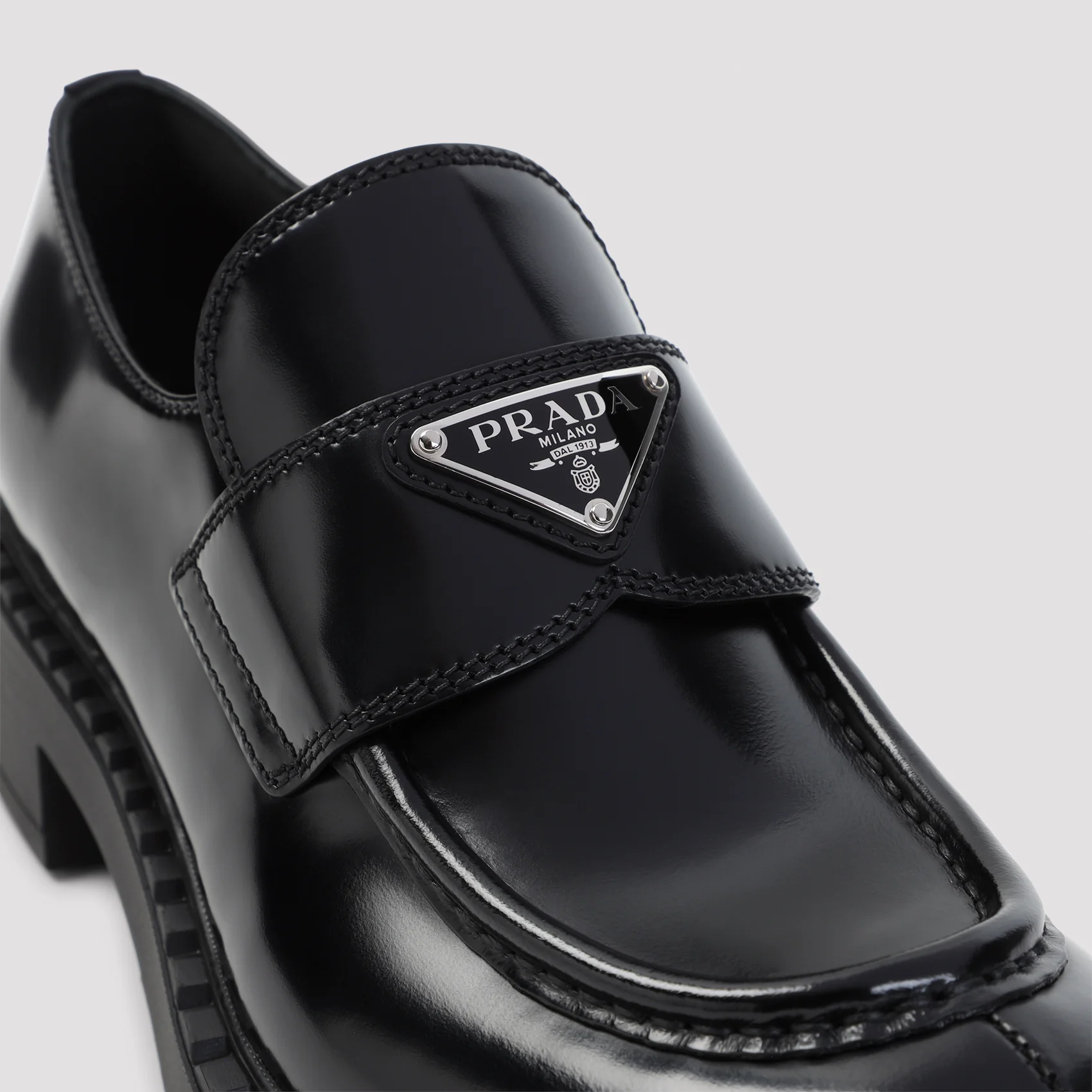 Prada Women’s Calf Leather & Rubber Slip-On Loafers with Signature Print Motif (Fall/Winter 2026) - Image 7